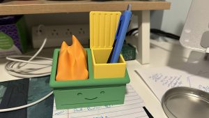 Dumpster fire pen holder